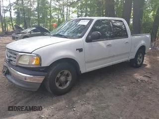 2003 Ford F-150 XLT with VIN 1FTRW07663KD69809, listed as a IAAI auction lot 42198549 with 166,466 mi miles and . Bid and sale history available at DreamBid. Image 2.