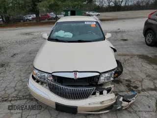 1998 Lincoln Continental with VIN 1LNFM97V5WY720999, listed as a Copart auction lot 84705054 with 0 mi miles and Salvage Title. Bid and sale history available at carsss.com. Image 5.
