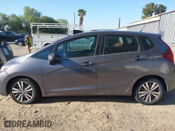 2015 Honda Fit EX-L with VIN 3HGGK5H88FM772964, listed as a IAAI auction lot 42020142 with 154,799 mi miles. Bid and sale history available at carsss.com. Image 14.