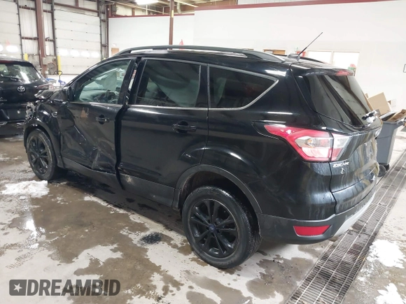 2018 Ford Escape SE with VIN 1FMCU9GD7JUD36295, listed as a IAAI auction lot 41855037 with 85,305 mi miles. Bid and sale history available at carsss.com. Image 3.