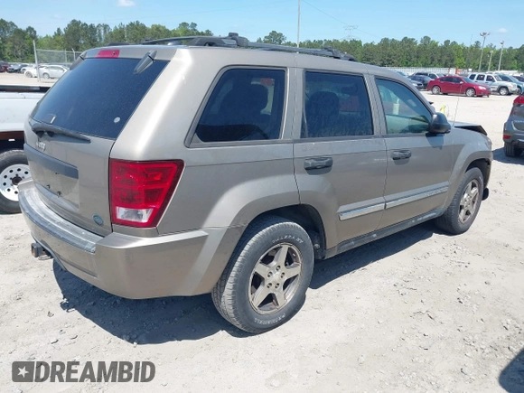 2005 Jeep Grand Cherokee Laredo with VIN 1J4HS48NX5C656582, listed as a IAAI auction lot 42079746 with Not Provided miles and . Bid and sale history available at DreamBid. Image 4.