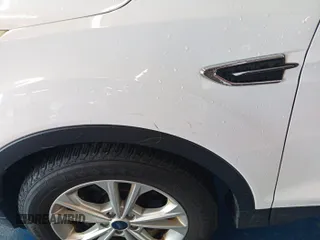 2017 Ford Escape SE z VIN 1FMCU0GD2HUD67783, wystawiony jako IAAI lot #42575794 z przebiegiem 98 188 mil mil oraz . Historia ofert i sprzedaży dostępna na DreamBid. Obrazek 10.