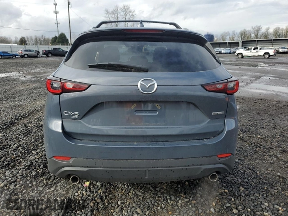 2024 Mazda CX-5 S Carbon Edition z VIN JM3KFBCM4R0392759, wystawiony jako Copart lot #45571245 z przebiegiem 7594 mil mil oraz Szkody całkowita. Historia ofert i sprzedaży dostępna na DreamBid. Obrazek 6.