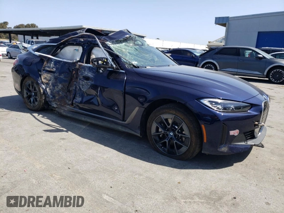 2024 BMW i4 eDrive40 with VIN WBY73AW03RFS22088, listed as a Copart auction lot 54831704 with 3,581 mi miles and Salvage Title. Bid and sale history available at carsss.com. Image 4.