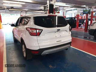 2017 Ford Escape SE z VIN 1FMCU0GD2HUD67783, wystawiony jako IAAI lot #42575794 z przebiegiem 98 188 mil mil oraz . Historia ofert i sprzedaży dostępna na DreamBid. Obrazek 7.