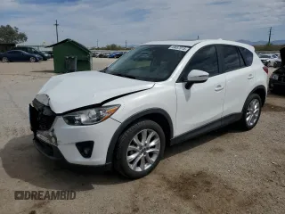2015 Mazda CX-5 Grand Touring with VIN JM3KE2DY3F0499382, listed as a Copart auction lot 49657015 with 110,422 mi miles and Salvage Title. Bid and sale history available at carsss.com. Image 1.
