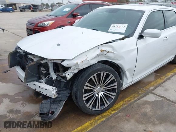 2013 Chrysler 300 with VIN 2C3CCABGXDH735739, listed as a IAAI auction lot 41282492 with 121,487 mi miles. Bid and sale history available at carsss.com. Image 6.