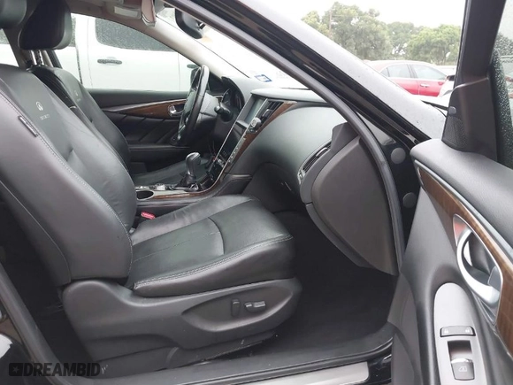 2014 Infiniti Q50 with VIN JN1BV7AP5EM674324, listed as a IAAI auction lot 39309092 with 112,779 mi miles. Bid and sale history available at carsss.com. Image 5.