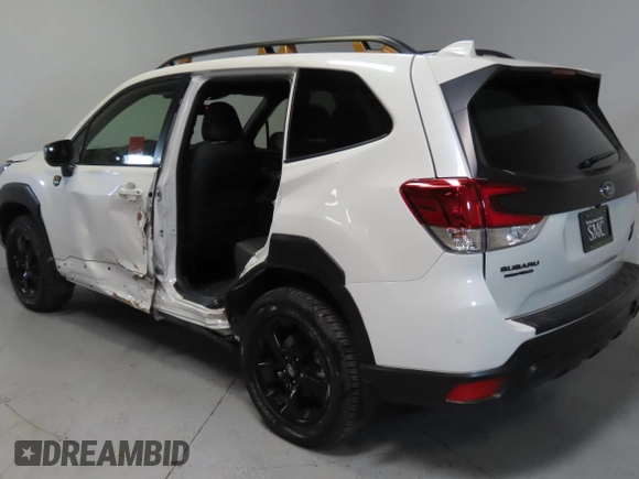 2023 Subaru Forester Wilderness with VIN JF2SKAMC7PH464218, listed as a Copart auction lot 64319995 with 8,827 mi miles and Salvage title. Bid and sale history available at DreamBid. Image 4.