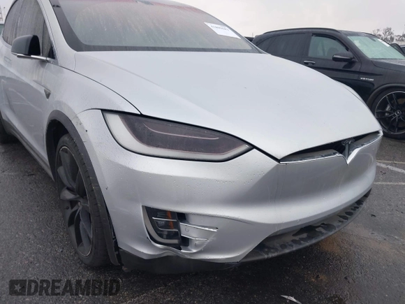 2016 Tesla Model X P90D with VIN 5YJXCBE41GF006284, listed as a IAAI auction lot 41809683 with 71,135 mi miles. Bid and sale history available at carsss.com. Image 6.