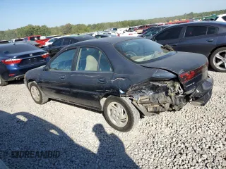 2001 Ford Escort Fleet with VIN 3FAFP13PX1R120920, listed as a Copart auction lot 75643024 with 128,089 mi miles and Salvage Title. Bid and sale history available at carsss.com. Image 2.