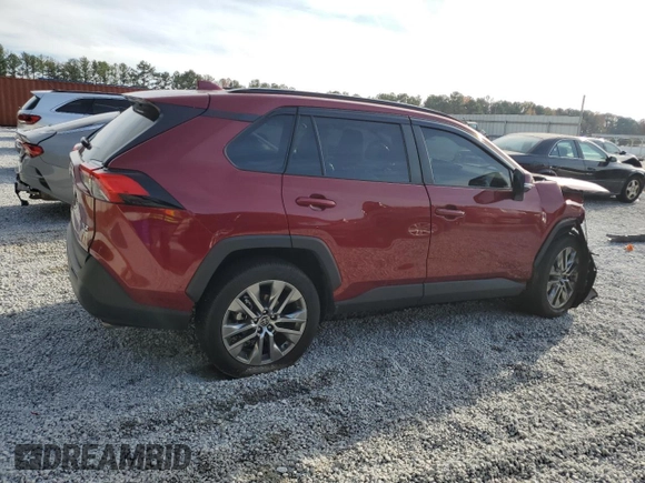 2022 Toyota RAV4 XLE Premium with VIN 2T3C1RFV5NW226684, listed as a Copart auction lot 82759894 with 19,722 mi miles and Salvage Title. Bid and sale history available at carsss.com. Image 3.