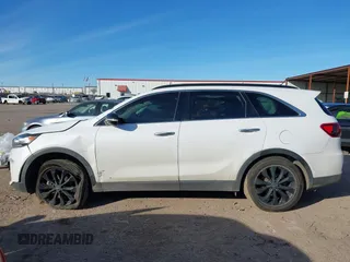 2020 Kia Sorento LX V6 with VIN 5XYPG4A59LG661617, listed as a IAAI auction lot 41279414 with 148,845 mi miles. Bid and sale history available at carsss.com. Image 14.