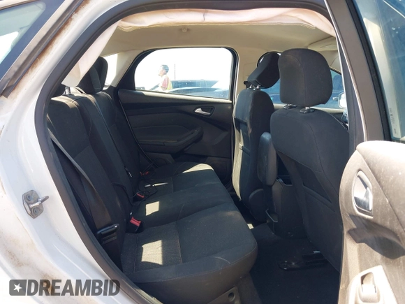2016 Ford Focus SE z VIN 1FADP3F23GL338496, wystawiony jako IAAI lot #42333608 z przebiegiem 76 972 mil mil oraz . Historia ofert i sprzedaży dostępna na DreamBid. Obrazek 8.