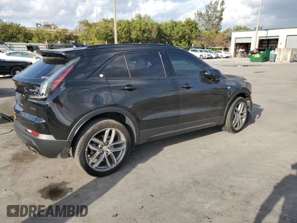 2019 Cadillac XT4 AWD Sport z VIN 1GYFZFR48KF100558, wystawiony jako Copart lot #48112045 z przebiegiem 63 689 mil mil oraz Nie do naprawy • Non repairable. Historia ofert i sprzedaży dostępna na DreamBid. Obrazek 3.