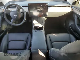2023 Tesla Model 3 with VIN 5YJ3E1EA4PF556782, listed as a Copart auction lot 55626935 with 26,615 mi miles and Salvage title. Bid and sale history available at DreamBid. Image 8.