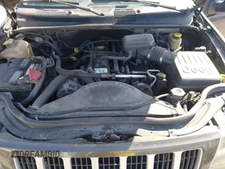 2004 Jeep Grand Cherokee Laredo with VIN 1J4GW48S74C401022, listed as a IAAI auction lot 41982319 with 170,607 mi miles. Bid and sale history available at carsss.com. Image 10.