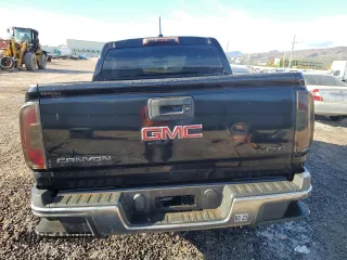 2016 GMC Canyon 2WD SLE with VIN 1GTG5CE35G1256661, listed as a Copart auction lot 82244644 with 104,496 mi miles and Clean Title. Bid and sale history available at carsss.com. Image 6.