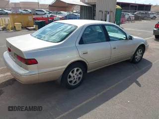 1999 Toyota Camry LE z VIN JT2BF22K9X0222119, wystawiony jako IAAI lot #41529258 z przebiegiem 119 919 mil mil oraz . Historia ofert i sprzedaży dostępna na DreamBid. Obrazek 4.