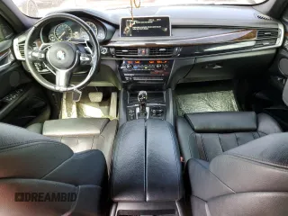 2015 BMW X6 xDrive50i with VIN 5UXKU6C5XF0F94498, listed as a Copart auction lot 67776034 with 106,579 mi miles and Non Repairable. Bid and sale history available at carsss.com. Image 8.