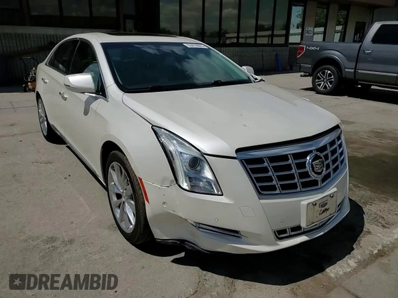 2014 Cadillac XTS Luxury z VIN 2G61M5S33E9193905, wystawiony jako Copart lot #55479605 z przebiegiem 143 006 mil mil oraz Szkoda całkowita • Salvage title. Historia ofert i sprzedaży dostępna na DreamBid. Obrazek 13.