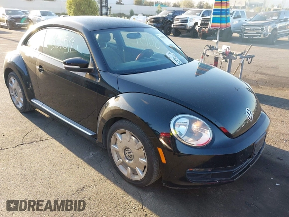 2012 Volkswagen Beetle 2.5L w/Sound/Nav PZEV with VIN 3VWJP7AT7CM661055, listed as a IAAI auction lot 41980159 with 113,678 mi miles and . Bid and sale history available at DreamBid. Image 1.