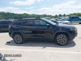 2020 Jeep Cherokee Latitude z VIN 1C4PJMCX3LD584466, wystawiony jako IAAI lot #42380627 z przebiegiem 53 062 mil mil oraz . Historia ofert i sprzedaży dostępna na DreamBid. Obrazek 13.