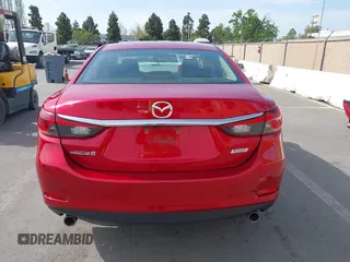 2017 Mazda Mazda6 Touring with VIN JM1GL1V56H1155982, listed as a IAAI auction lot 42055447 with 59,566 mi miles. Bid and sale history available at carsss.com. Image 17.