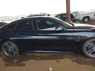 2018 BMW 4 Series 440i with VIN WBA4J5C50JBF07036, listed as a IAAI auction lot 41787949 with 68,821 mi miles and . Bid and sale history available at carsss.com. Image 14.