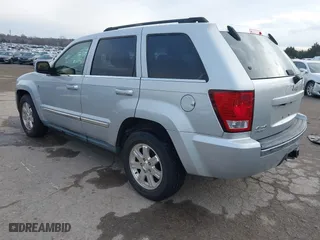 2009 Jeep Grand Cherokee Limited with VIN 1J8HR58P99C538725, listed as a IAAI auction lot 41466122 with 220,803 mi miles. Bid and sale history available at carsss.com. Image 3.