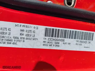 2016 Dodge Charger SXT with VIN 2C3CDXHGXGH242686, listed as a IAAI auction lot 41771868 with 187,488 mi miles. Bid and sale history available at carsss.com. Image 9.