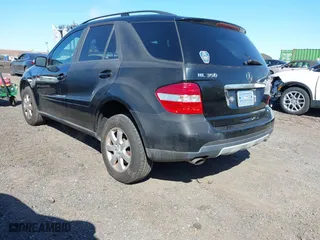 2006 Mercedes-Benz M-Class 3.5L with VIN 4JGBB86E06A121940, listed as a IAAI auction lot 42069185 with 127,660 mi miles. Bid and sale history available at carsss.com. Image 3.