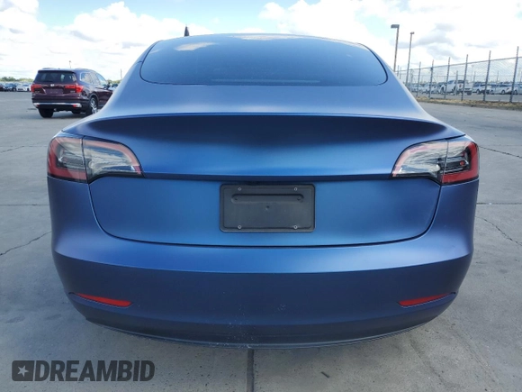 2023 Tesla Model 3 with VIN 5YJ3E1EA8PF626090, listed as a Copart auction lot 56892915 with Not provided miles and Salvage title. Bid and sale history available at DreamBid. Image 6.