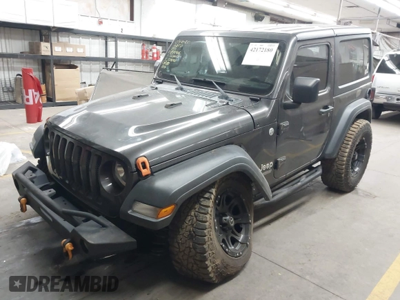 2020 Jeep Wrangler Sport S with VIN 1C4GJXAN4LW229040, listed as a IAAI auction lot 42172180 with 58,701 mi miles and . Bid and sale history available at DreamBid. Image 2.