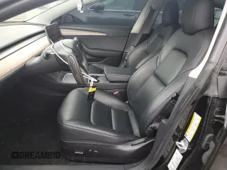 2023 Tesla Model 3 with VIN 5YJ3E1EA3PF644898, listed as a Copart auction lot 50427685 with 36,488 mi miles and Salvage Title. Bid and sale history available at DreamBid. Image 7.