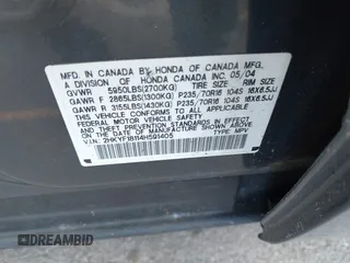 2004 Honda Pilot LX with VIN 2HKYF18114H591405, listed as a IAAI auction lot 42386073 with 71,295 mi miles and . Bid and sale history available at DreamBid. Image 9.