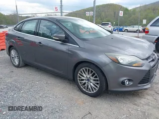 2013 Ford Focus Titanium with VIN 1FADP3J28DL225887, listed as a IAAI auction lot 42122968 with 139,248 mi miles and . Bid and sale history available at carsss.com. Image 1.