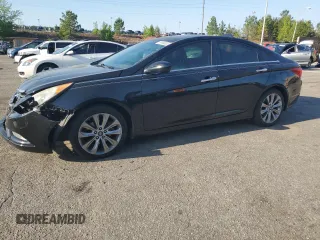 2012 Hyundai Sonata Limited z VIN 5NPEC4AC4CH429064, wystawiony jako Copart lot #53499355 z przebiegiem 203 928 mil mil oraz Szkody całkowita. Historia ofert i sprzedaży dostępna na DreamBid. Obrazek 1.
