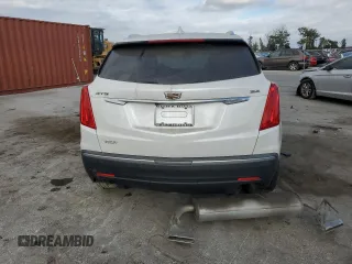2018 Cadillac XT5 Luxury FWD with VIN 1GYKNCRS8JZ182473, listed as a Copart auction lot 60338405 with 76,595 mi miles and Salvage title. Bid and sale history available at DreamBid. Image 6.