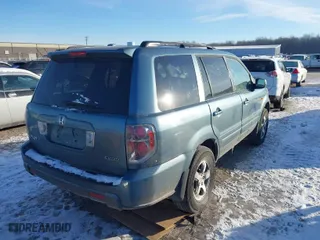 2008 Honda Pilot EX-L with VIN 5FNYF18528B024854, listed as a IAAI auction lot 41388454 with 116,955 mi miles. Bid and sale history available at carsss.com. Image 4.