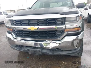 2016 Chevrolet Silverado 1500 LT with VIN 1GCVKREH3GZ233606, listed as a IAAI auction lot 42111728 with 90,449 mi miles and . Bid and sale history available at DreamBid. Image 6.