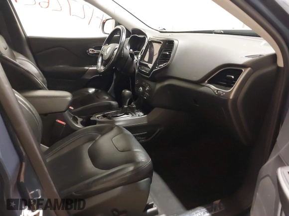 2020 Jeep Cherokee Limited with VIN 1C4PJMDX2LD516951, listed as a IAAI auction lot 41272629 with 99,717 mi miles and . Bid and sale history available at DreamBid. Image 5.