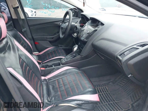 2018 Ford Focus SE with VIN 1FADP3F28JL302634, listed as a IAAI auction lot 42103219 with 71,682 mi miles and . Bid and sale history available at DreamBid. Image 5.