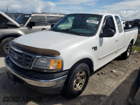 2003 Ford F-150 XL with VIN 1FTRX17L53NB90331, listed as a Copart auction lot 76686124 with 0 mi miles and Salvage Title. Bid and sale history available at carsss.com. Image 1.