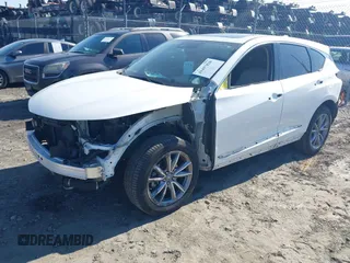 2020 Acura RDX Technology with VIN 5J8TC1H52LL006185, listed as a IAAI auction lot 41457828 with 59,998 mi miles and . Bid and sale history available at DreamBid. Image 2.