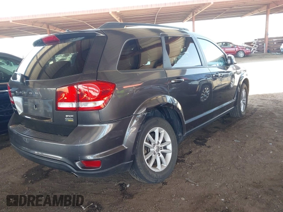 2015 Dodge Journey SXT with VIN 3C4PDCBG6FT569512, listed as a IAAI auction lot 42532676 with 98,952 mi miles and . Bid and sale history available at DreamBid. Image 4.