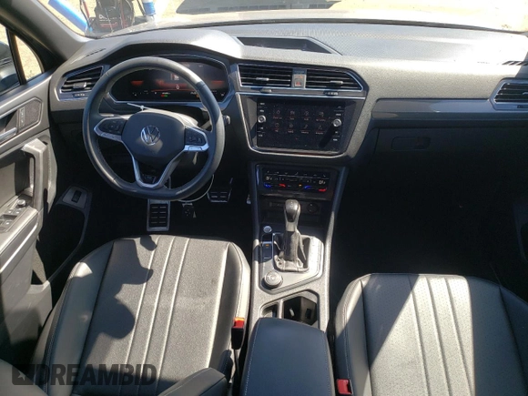 2023 Volkswagen Tiguan SE R-Line Black with VIN 3VV8B7AX3PM090643, listed as a Copart auction lot 52225065 with 60,680 mi miles and Salvage title. Bid and sale history available at DreamBid. Image 8.
