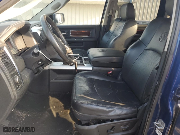2009 Dodge Ram 1500 Laramie with VIN 1D3HB13T89J521779, listed as a Copart auction lot 48239135 with 144,414 mi miles and Salvage Title. Bid and sale history available at carsss.com. Image 7.