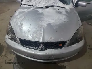 2006 Mitsubishi Lancer with VIN JA3AJ66F46U057530, listed as a Copart auction lot 87750605 with 180,243 mi miles and Salvage Title. Bid and sale history available at DreamBid. Image 11.