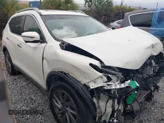 2016 Nissan Rogue SV with VIN 5N1AT2MT2GC877380, listed as a IAAI auction lot 41352770 with 193,174 mi miles. Bid and sale history available at carsss.com. Image 1.